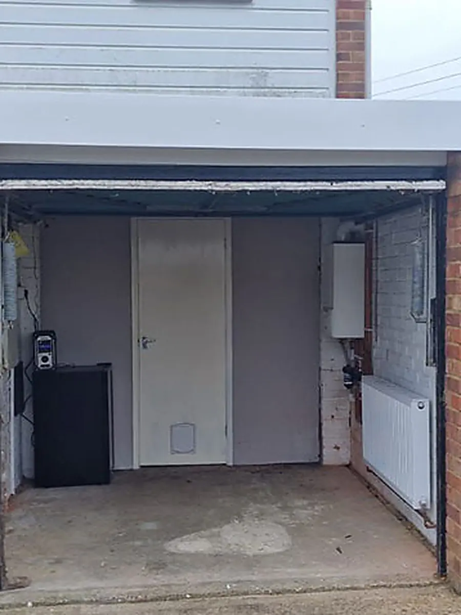 A garage being converted into a habitable room