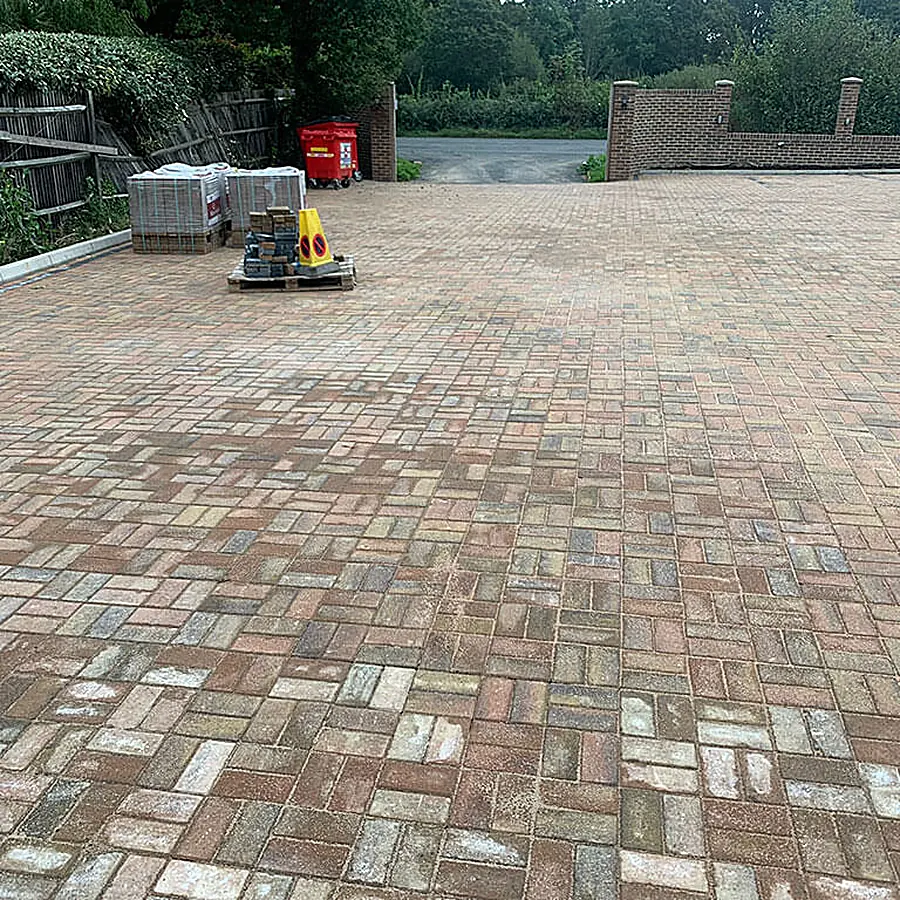 Close up of multi tone red and grey block paving