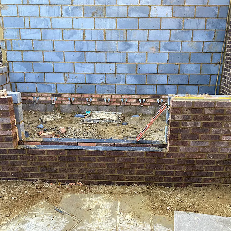Brick and block cavity walls with a window opening formed