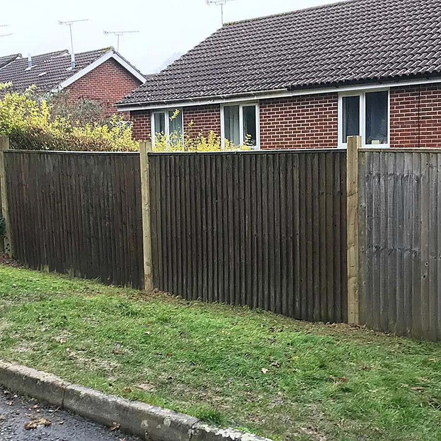 A new close board fence along a lawn